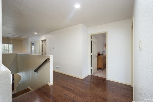 interior space with dark wood-type flooring