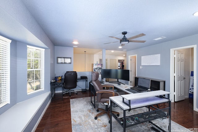 office space featuring dark wood-type flooring and ceiling fan