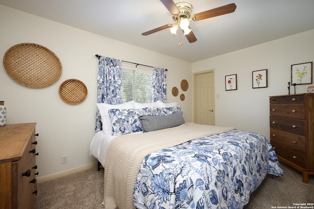 carpeted bedroom featuring ceiling fan