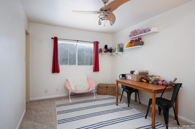 office with ceiling fan and light colored carpet