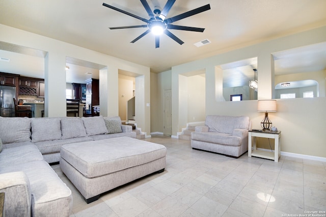 living room with ceiling fan