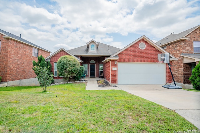 view of property with a front yard and a garage