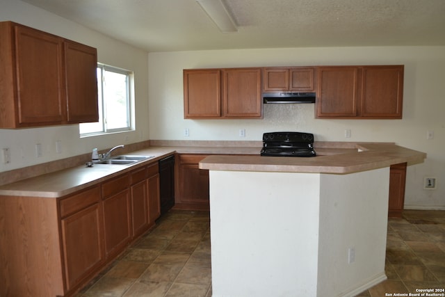 kitchen featuring black appliances, a textured ceiling, and sink