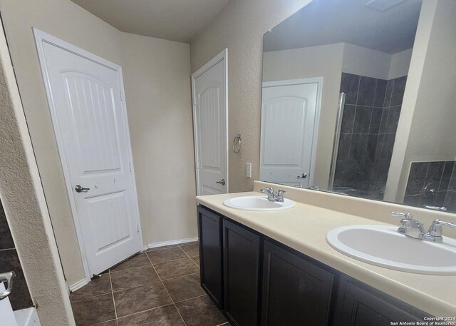 walk in closet featuring light carpet