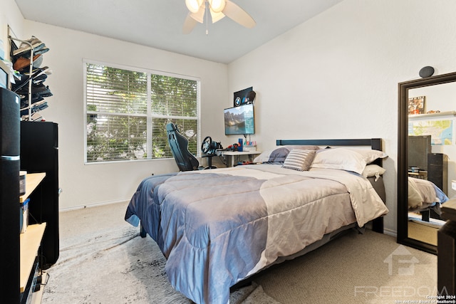 bedroom featuring light carpet and ceiling fan