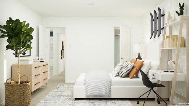 bedroom featuring light colored carpet