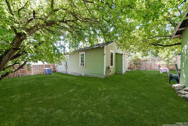 143 Paul St, San Antonio, TX 78203 - exterior space with a yard and a fenced backyard