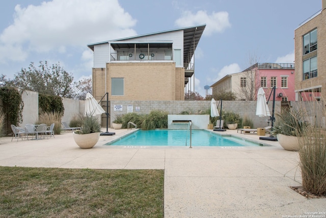 view of pool with a patio area