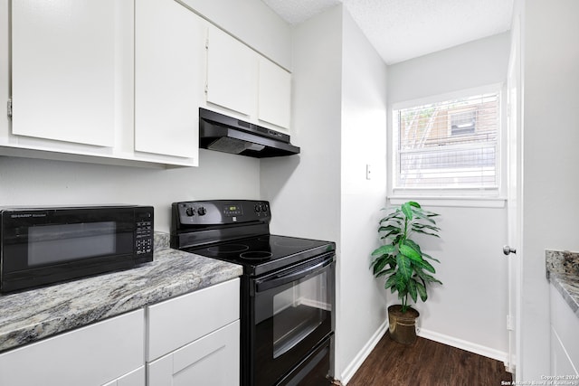 kitchen with a textured ceiling, dark hardwood / wood-style flooring, black appliances, white cabinetry, and light stone counters