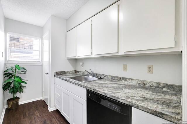 kitchen featuring white cabinetry, a textured ceiling, dishwasher, dark hardwood / wood-style flooring, and sink