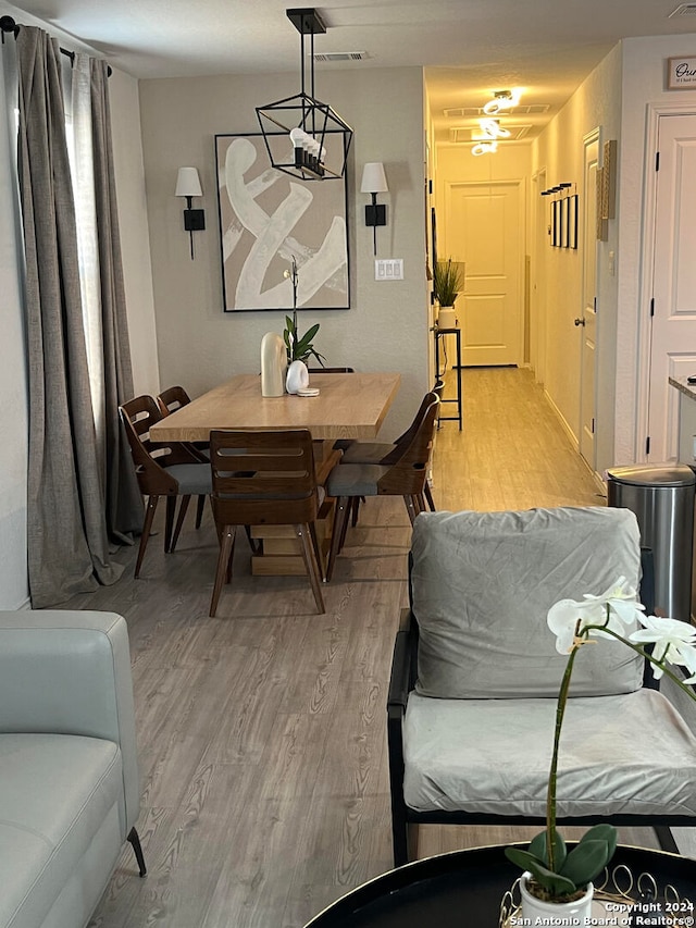 dining space featuring light hardwood / wood-style flooring