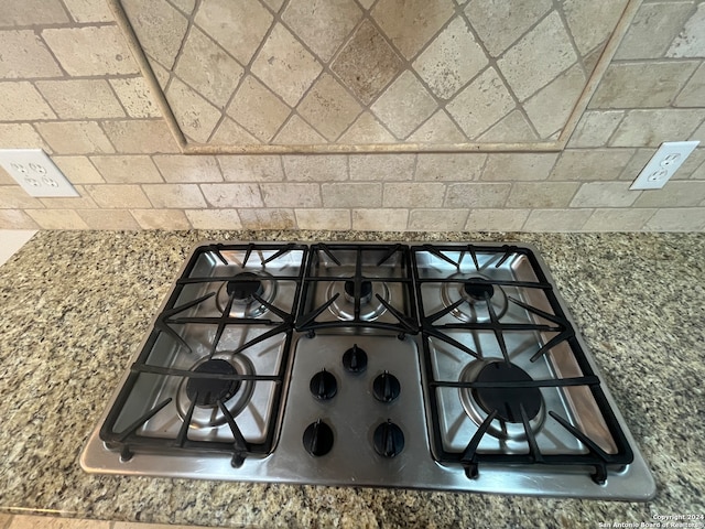 room details with stainless steel gas cooktop