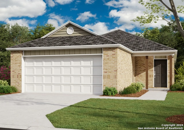 exterior space with a front yard and a garage