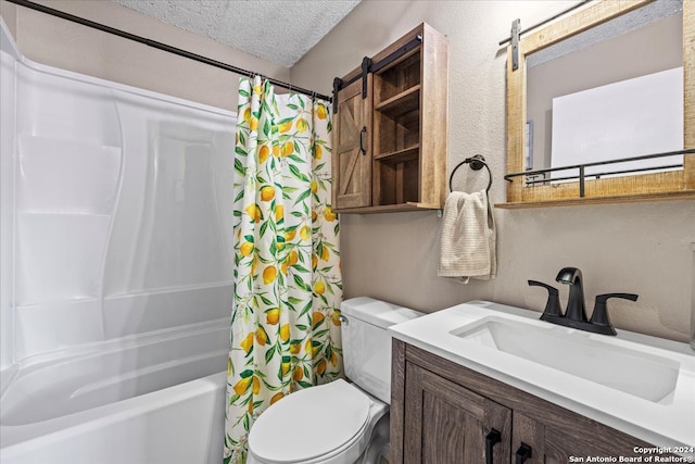 full bathroom featuring vanity, toilet, shower / bath combination with curtain, and a textured ceiling