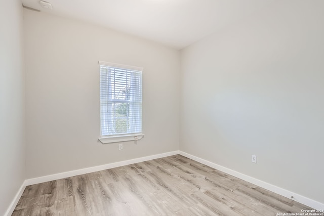 empty room featuring light hardwood / wood-style floors