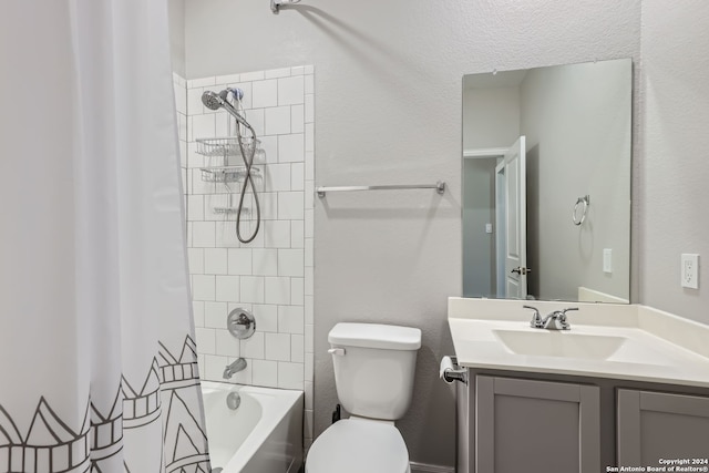 full bathroom with vanity, toilet, and shower / tub combo with curtain