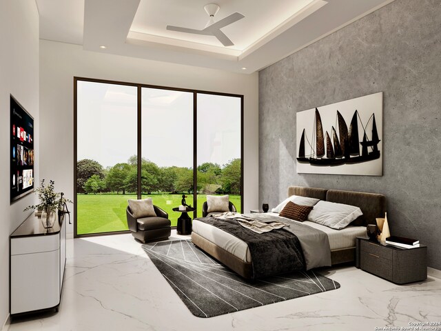 bedroom featuring a tray ceiling, ceiling fan, and access to exterior