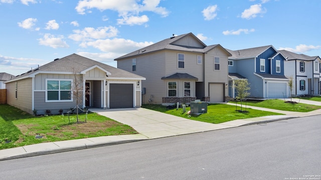 view of front facade featuring a front lawn and a garage