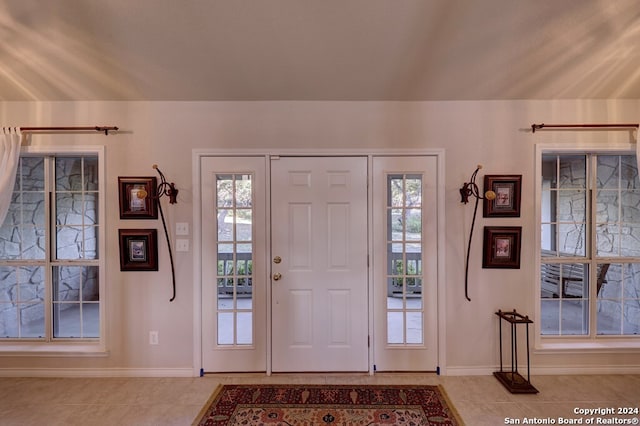 entryway featuring light tile patterned floors