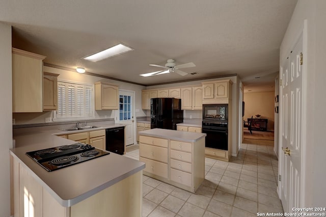 kitchen with black appliances, light tile patterned floors, a center island, sink, and ceiling fan