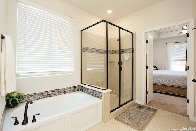 bathroom with tile patterned floors, independent shower and bath, and ceiling fan