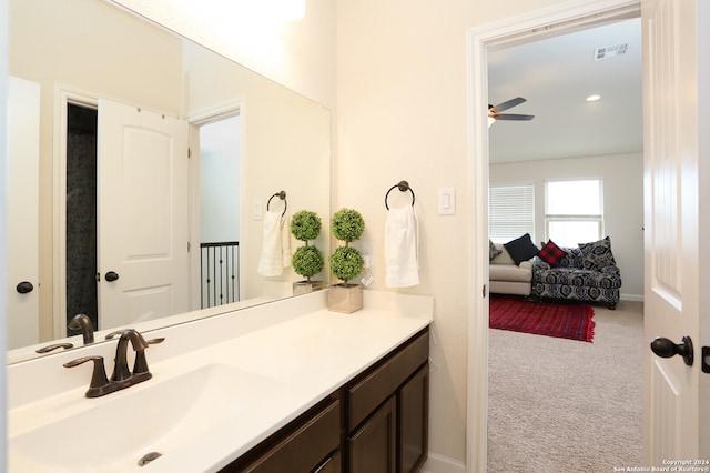 bathroom with vanity and ceiling fan