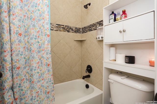 bathroom with shower / bath combo and toilet