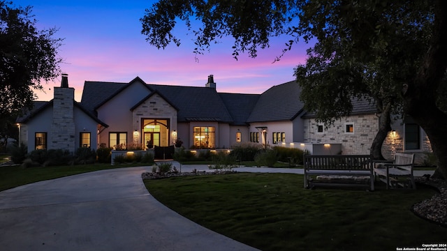 view of front of home featuring a yard