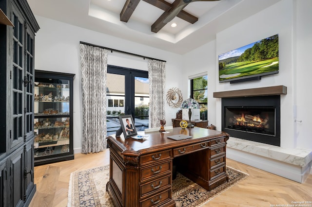 office space with french doors, beam ceiling, ceiling fan, and light hardwood / wood-style floors