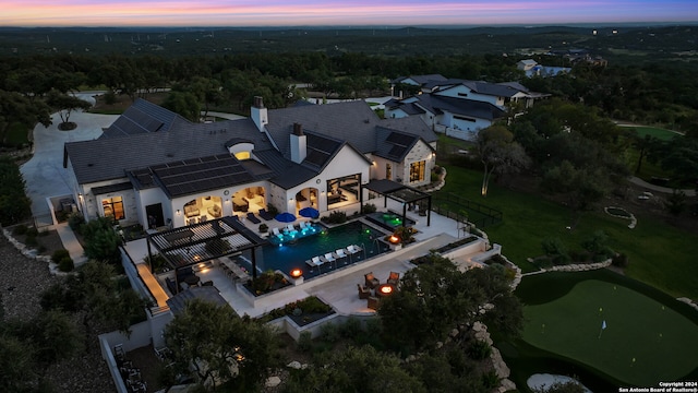 view of aerial view at dusk