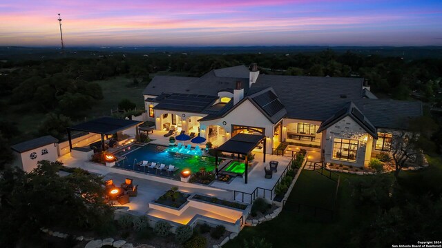 view of aerial view at dusk