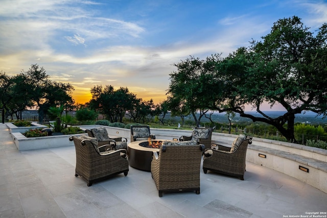 view of patio featuring a fire pit