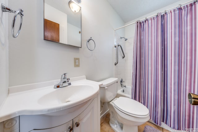 full bathroom with vanity, toilet, a textured ceiling, and shower / bath combo