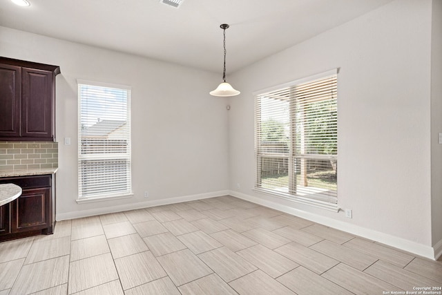 view of unfurnished dining area