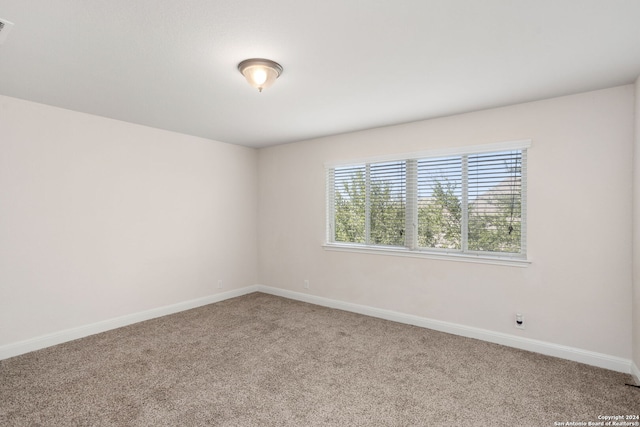 empty room with carpet floors