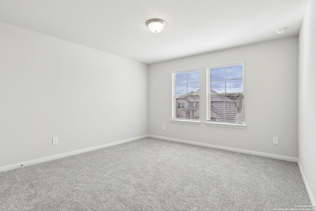 empty room featuring carpet