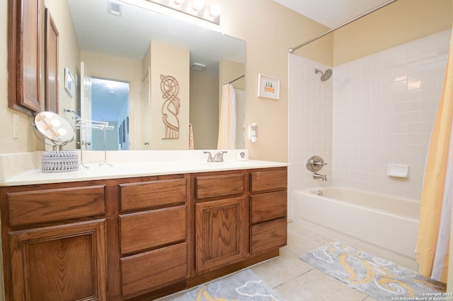 bathroom with vanity, tile patterned floors, and shower / bathtub combination with curtain