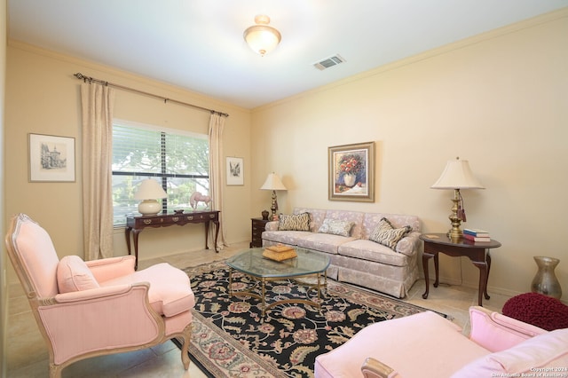 living room featuring light tile patterned flooring and ornamental molding