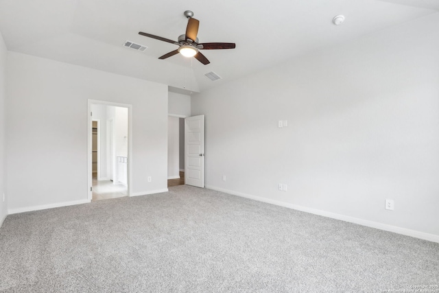 unfurnished bedroom with vaulted ceiling, ceiling fan, and carpet