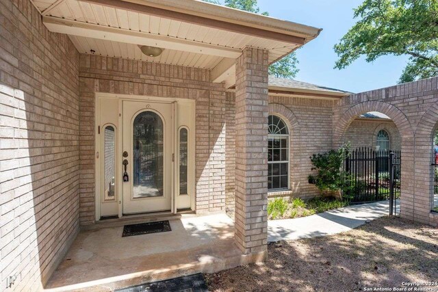 entrance to property with a porch