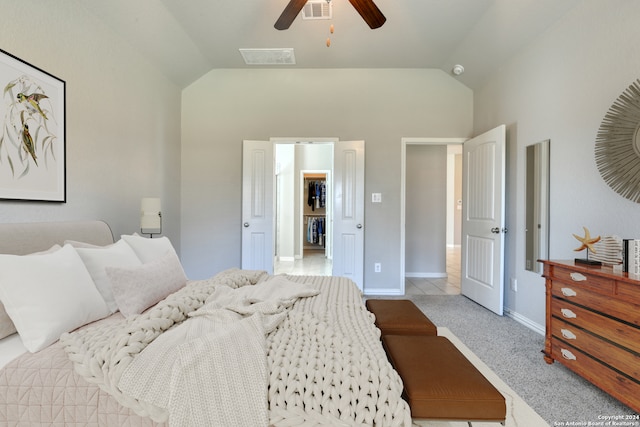 carpeted bedroom with lofted ceiling and ceiling fan