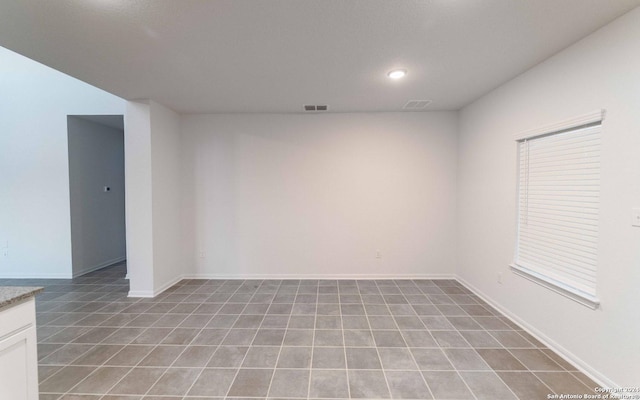 413 Tims Way, Seguin, TX 78155 - spare room with recessed lighting, baseboards, and light tile patterned flooring