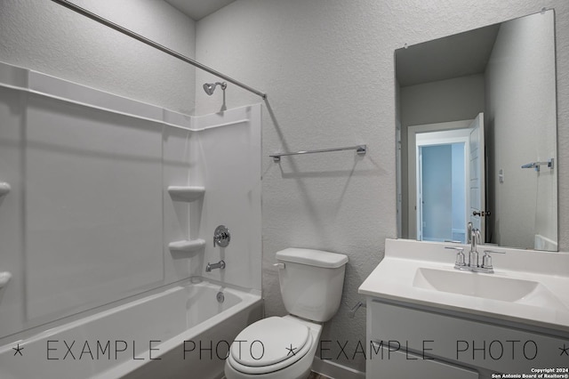 full bathroom featuring bathtub / shower combination, vanity, and toilet