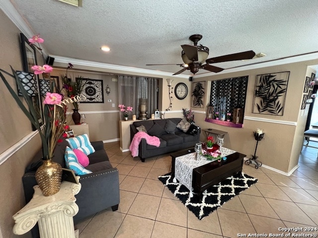 living room featuring crown molding, a textured ceiling, light tile patterned floors, and ceiling fan