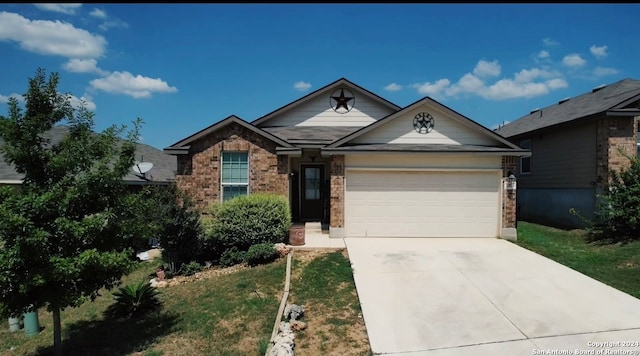 view of front of house featuring concrete driveway, an attached garage, and brick siding