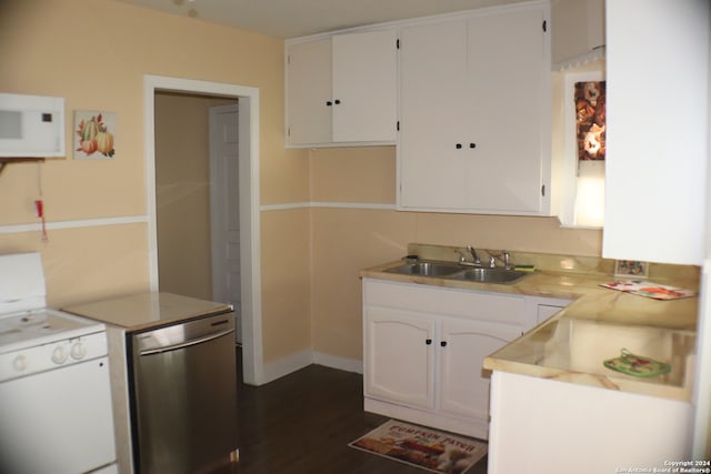 kitchen featuring white appliances, white cabinetry, sink, and dark hardwood / wood-style floors