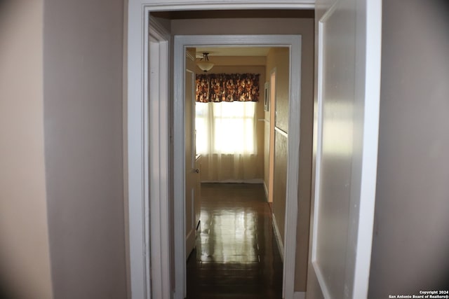 hallway featuring wood-type flooring