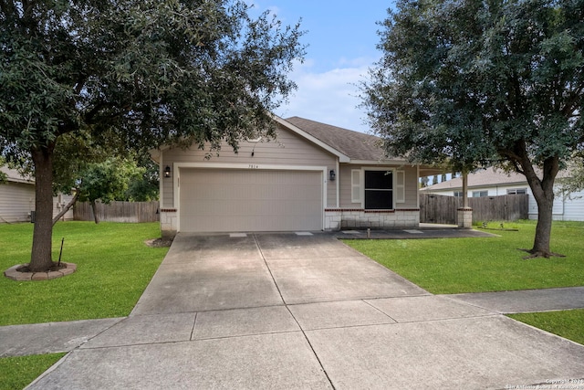 ranch-style home featuring a garage and a front lawn