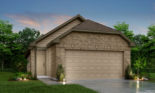 view of front of property featuring a garage and an outbuilding