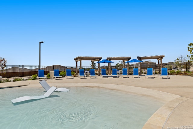 view of jungle gym with a pergola